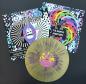 Preview: Assasination - Autumn Brown is the New Black LP gold/purple splatter + Flag
